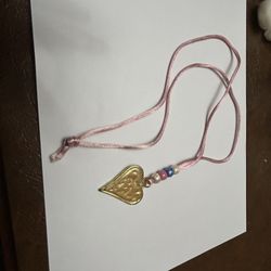 Heart, pendant, and pink cord with beads