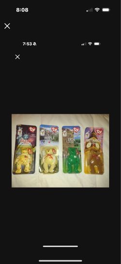Set of 4 TY Beanie Babies Glory,  Erin,  Britannia, And  Maple the Bear McDonalds 1999. New, unopened, plastic packing is yellowed.