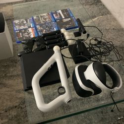 PS4 With Vr Set. Vr Gun . 4 Vr Sticks. Vr Motion Camera And 6 Games. 