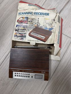 a vintage Realistic PRO-56 VHF scanning receiver, sold by RadioShack around the late 1970s to early 1980s.