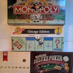 4 games The Deluxe Edition Monopoly , Chicago Edition Monopoly , Password and Yahtzee Deluxe 