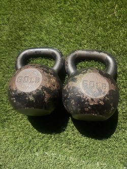 PAIR OF 60 LB CAST-IRON KETTLEBELLS – $150