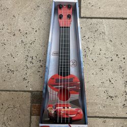 NWT Disney Pixar Cars Red Ukulele