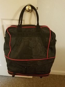 Red and black duffle bag
