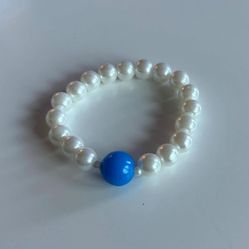 Elegant Handmade Pearl Bracelet with Blue Hope Accent Bead