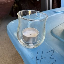 Votive holders with candles