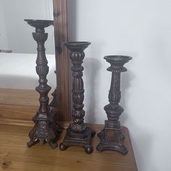 Tres candelabros por $20
