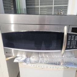 GE OVER THE OVEN MICROWAVE NEW