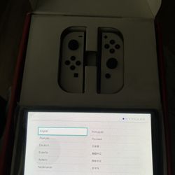 Nintendo Switch OLED + 1 Game