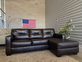 Leather reversible sectional- free delivery