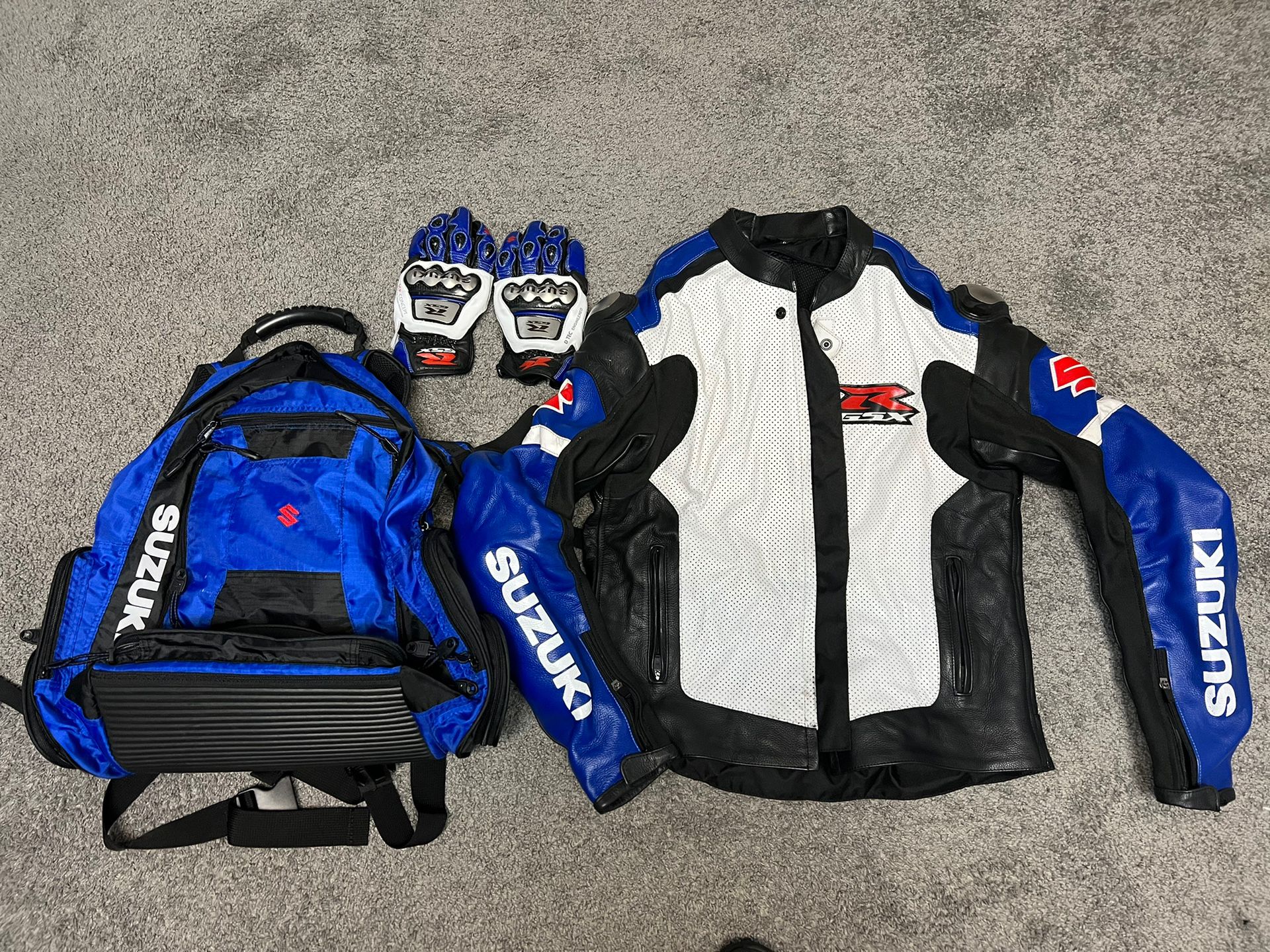 Suzuki Jacket (XL) Book Bag And Riding Gloves 