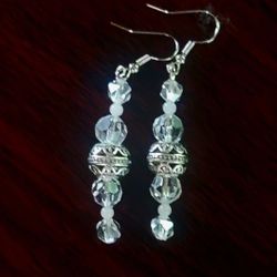 CATCH PRISMS OF LIGHT WITH THIS ARTESAN DESIGNED PAIR OF CRYSTAL SWING CHANDOLIER EARRINGS