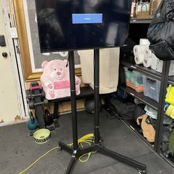 32-inch TV with stand. $100