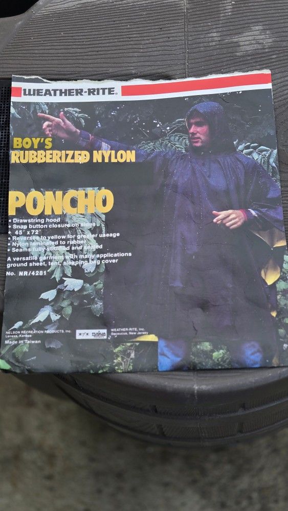 REVERSIBLE PONCHO $15.00