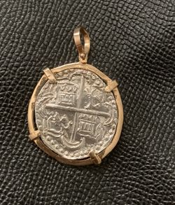 Atocha silver coin pendant in gold bezel