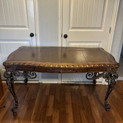 Wood Carved Desk With Leather Top And Steal Carved Legs 