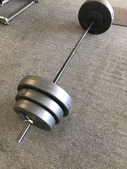 Gym Equipment Barbell and 100lbs of weights all included