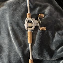 Real Tree bait caster fishing pole