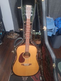 Left-handed Martin DM acoustic guitar