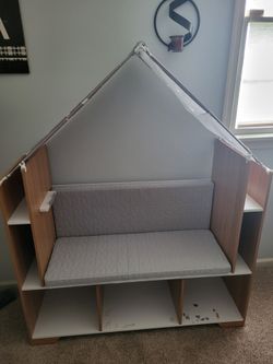 Kids play couch with book shelved