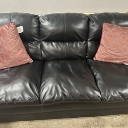 Selling 2 Black Couch 