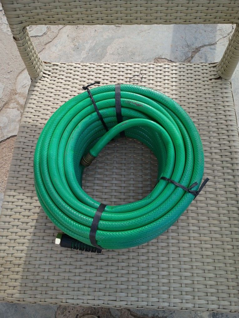 NEW WATER HOSE 100 FEET.