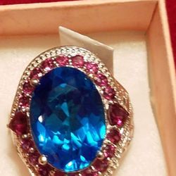 BRAND NEW NEVER BEN USED WITH THE TAG STERLING SILVER 925 BEAUTIFUL RING WITH LONDON BLUE TOPAZ AND RUBY RING SIZE 8