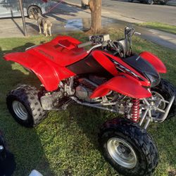 Moto Honda 400 Polaris 200