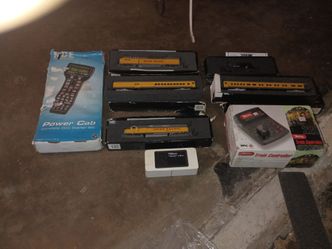 Model Train Lot with Controllers and Locomotives