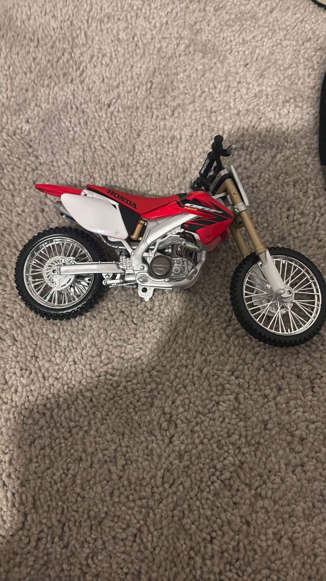 Two Toy Dirtbikes