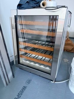 Sub- Zero Stainless Steel Glass Door Wine Storage
