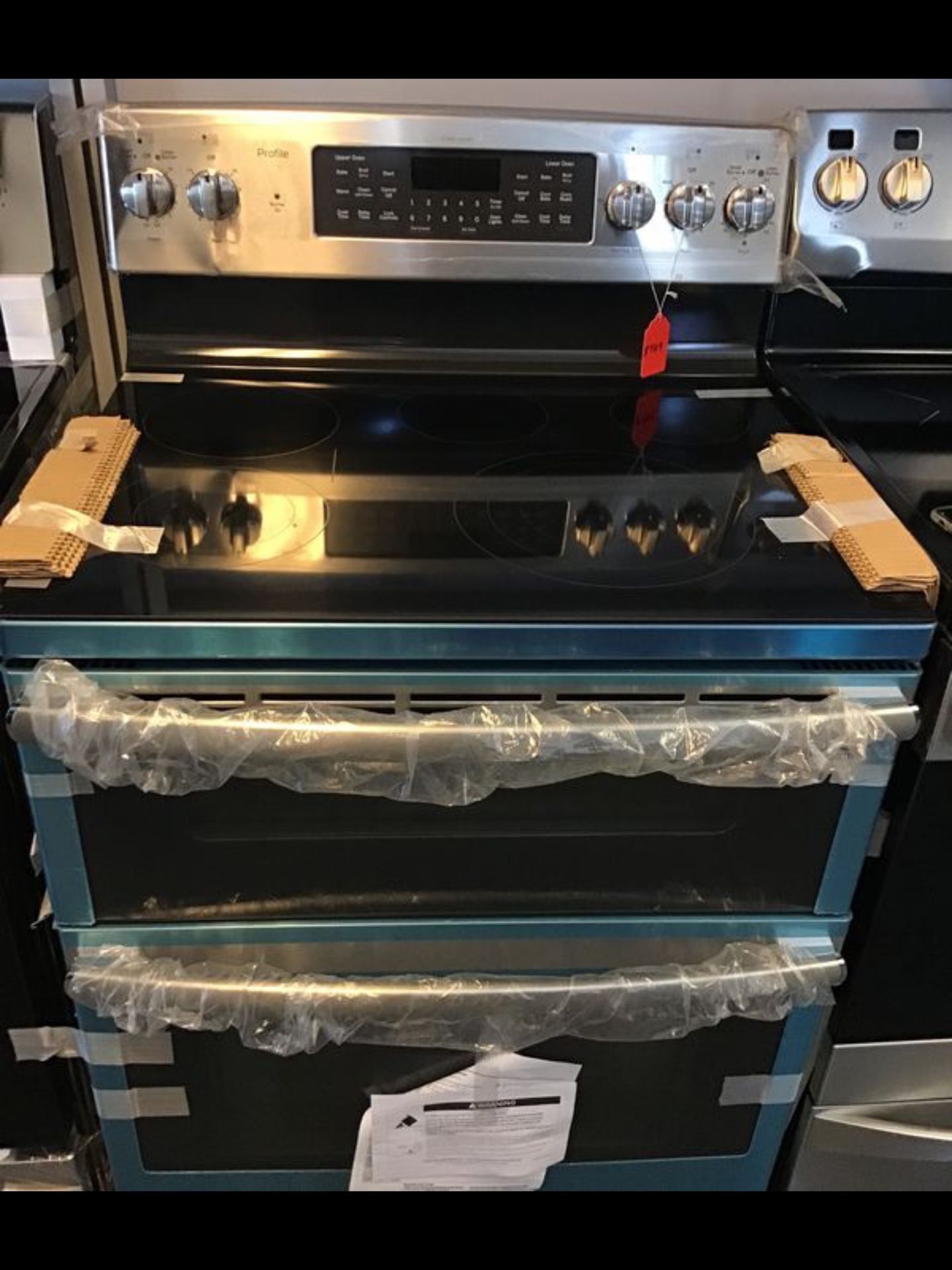 New scratch and dent Ge Profile 5 burner glass top stove double oven. 1 year warranty