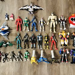 Bandai Power Rangers action figures and vehicles from the 1990s and early 2000s.  Items Included: The image features various figures from Mighty Morph