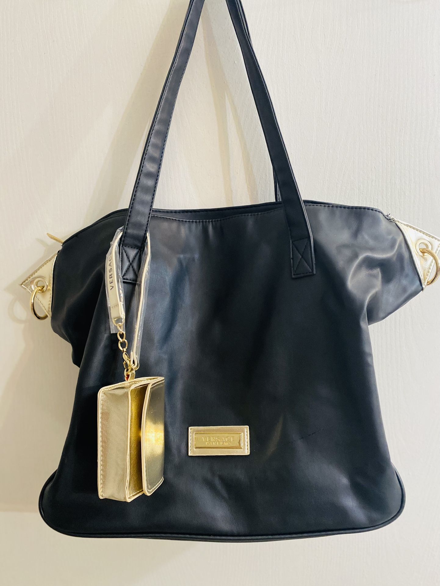 Versace Parfums Black Tote Bag extra small bag attached.