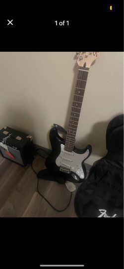 Electric guitar with a brand new amp