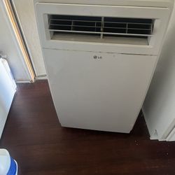 Portable Air Conditioner 12000 BTU’s Air Conditioner.  Lg Brand. Blows Refrigerated Air In The 40 Degrees