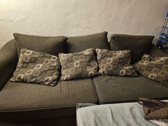 Sofa, love seat and ottoman for sale.
