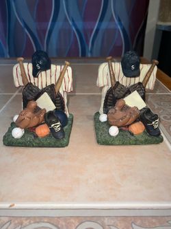 Two ceramic baseball bookends