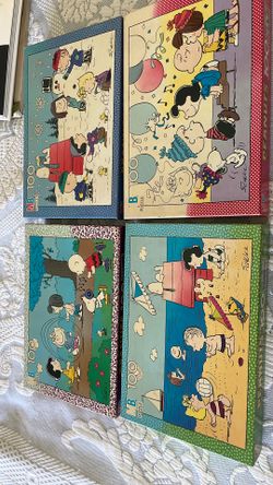 4 vintage Peanuts gang puzzles