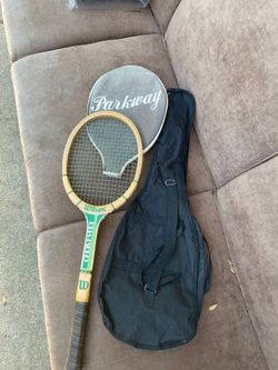 Tennis racket with cover