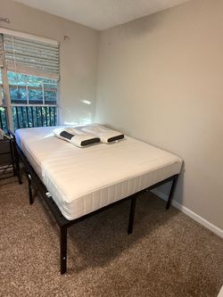 Tall Black Metal Queen Bed frame (20” tall- plenty of storage) & IKEA LP Queen Mattress