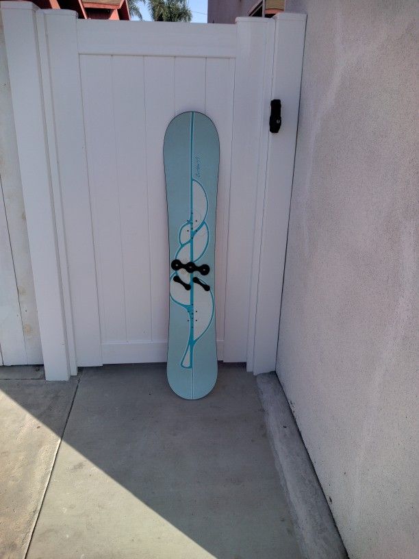 BURTON 49 Snowboard. 149cm. Has a little scrap on bottom of board that was fixed. Otherwise in very nice condition.