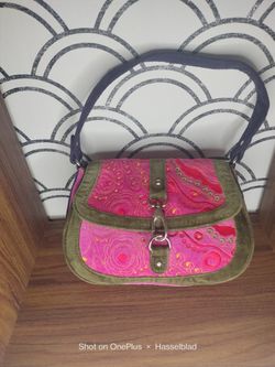 Authentic BCBGirls embroidered fabric shoulder bag