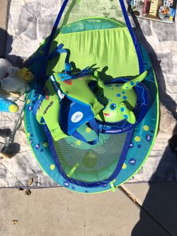 Life jacket and floating baby swimmer