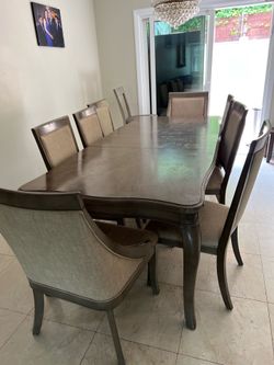 Dinner table and 8 chairs