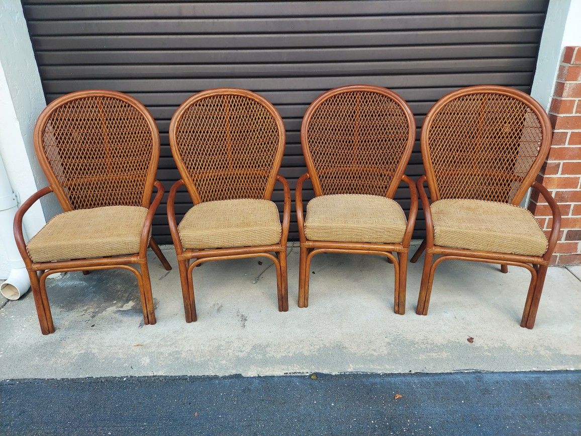 Set of Four Rattan Armchairs with Cushions - In Good Original Gently Used Condition - Measures 24" Wide x 26" Depth and 40 3/4" Tall. Seat 19" Tall. P