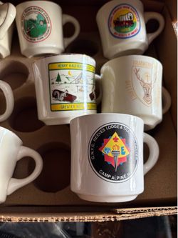 13,Vintage Boy Scout Mugs and a boys scout figurine