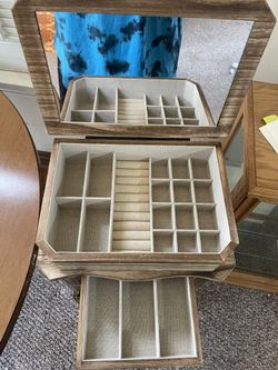 Jewelry box. 35 inches high, 14 inches wide, 10 inches deep.