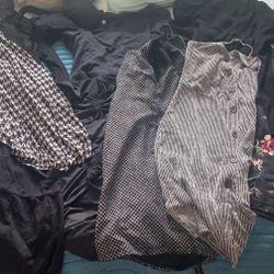 Bag Of Black Dresses Shirts And Pants 