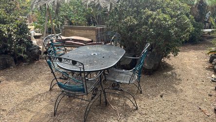 Outdoor table with rocking chairs